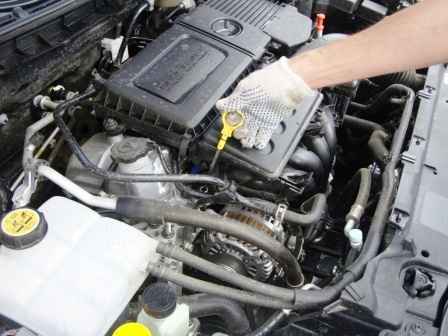 Проверка уровня жидкостей в Mazda 3
