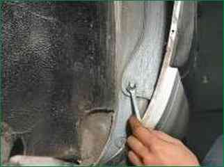 How to remove front fenders and fenders VAZ-2123