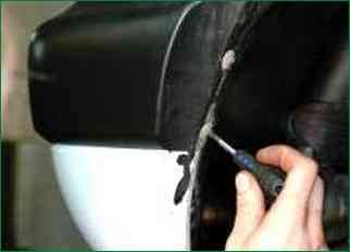 How to remove front fenders and fenders VAZ-2123