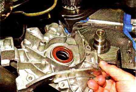 Removing and disassembling the oil pump of the VAZ-21114 engine