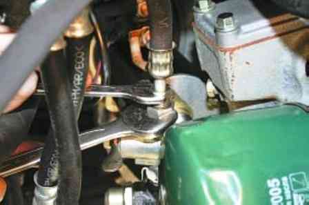 Removing the radiator and pressure reducing valve of the oil system ZMZ-409