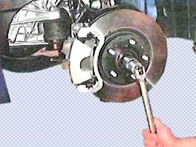 How to remove and install Toyota Camry front suspension knuckle