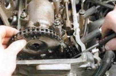 remove the sprocket from the camshaft