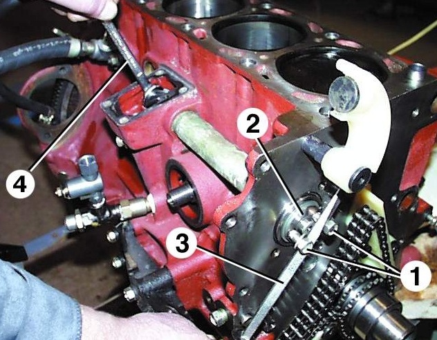 Снятие и установка промежуточного вала двигателя ЗМЗ-406