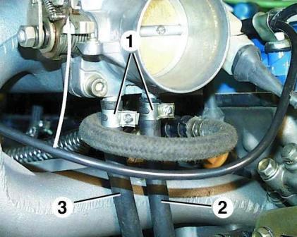 Loosen clamps 1 and remove hoses 2 and 3 from throttle body fittings