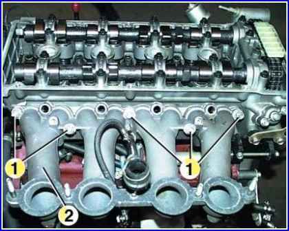 Extracción e instalación de la culata del motor ZMZ-406 engine