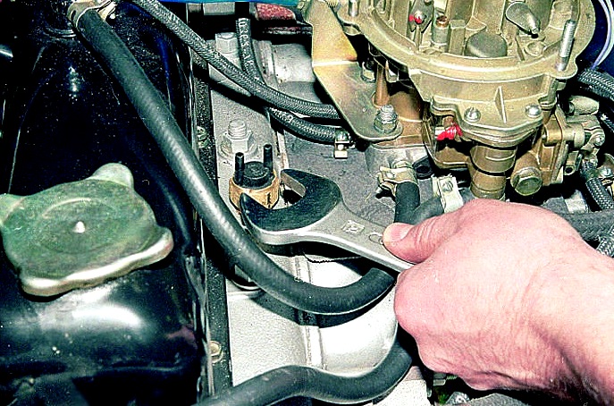 Extracción del interruptor de vacío térmico y válvula de recirculación