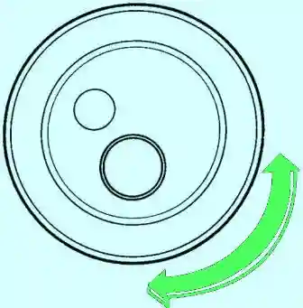 Снятие, проверка и установка зубчатого ремня KIA Sephia Вращая ролик механизма натяжения зубчатого ремня, проверьте отсутствие заеданий