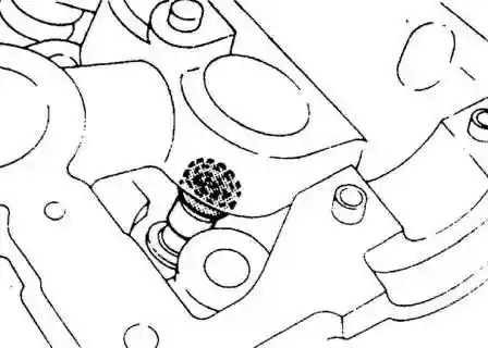 Установите клапан и по стержню клапана установите маслоотражательный колпачок