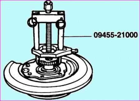 Removal and repair of the hub and trunnion of the rear axle of Kia Magentis and Optima