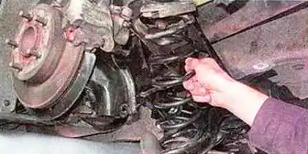 Mazda 3 артқы аспалы серіппені ауыстыру