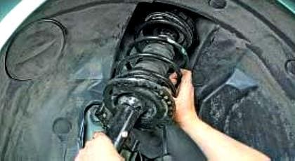 Replacing the front shock strut Renault Megan 2