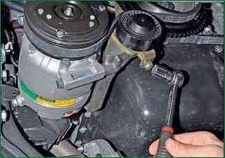 How to replace VAZ-2123 drive belt rollers