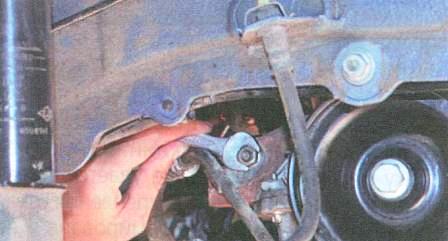 Remove the engine mounting bolt 