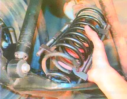 Renault Logan rear suspension spring replacement