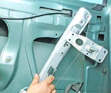 Rear window regulator replacement