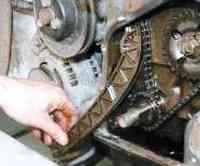 Replacing the VAZ-2123 chain tensioner shoe