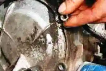 Replacing the VAZ-2123 chain tensioner shoe